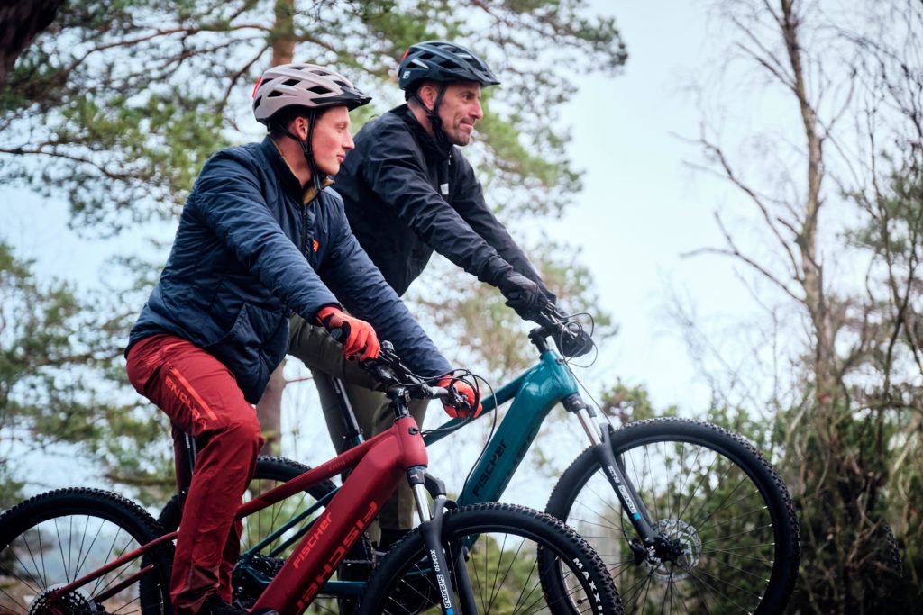 Two men on bicycles MTS